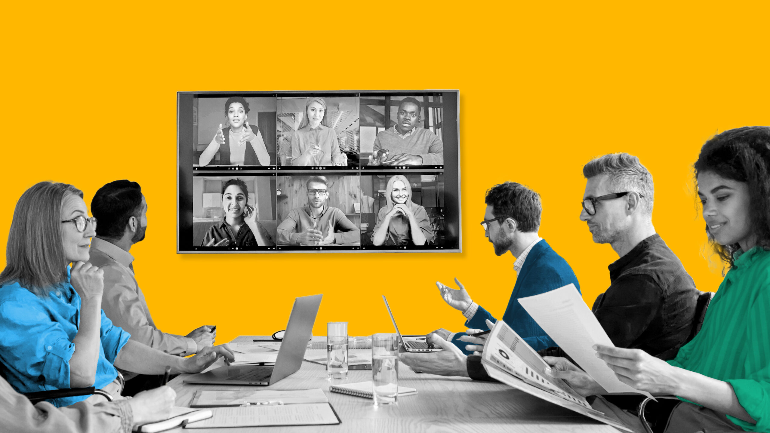 This image features people sitting around a table and more people engaging in the conversation through video conferencing. This image represents driving community through video marketing.